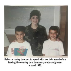 Rebecca taking time out to spend with her twin sons before leaving the country on a temporary duty assignment around 1993.